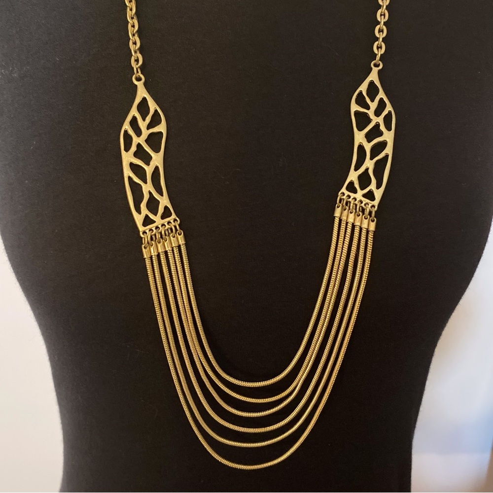 Gold toned FALCHI necklace.